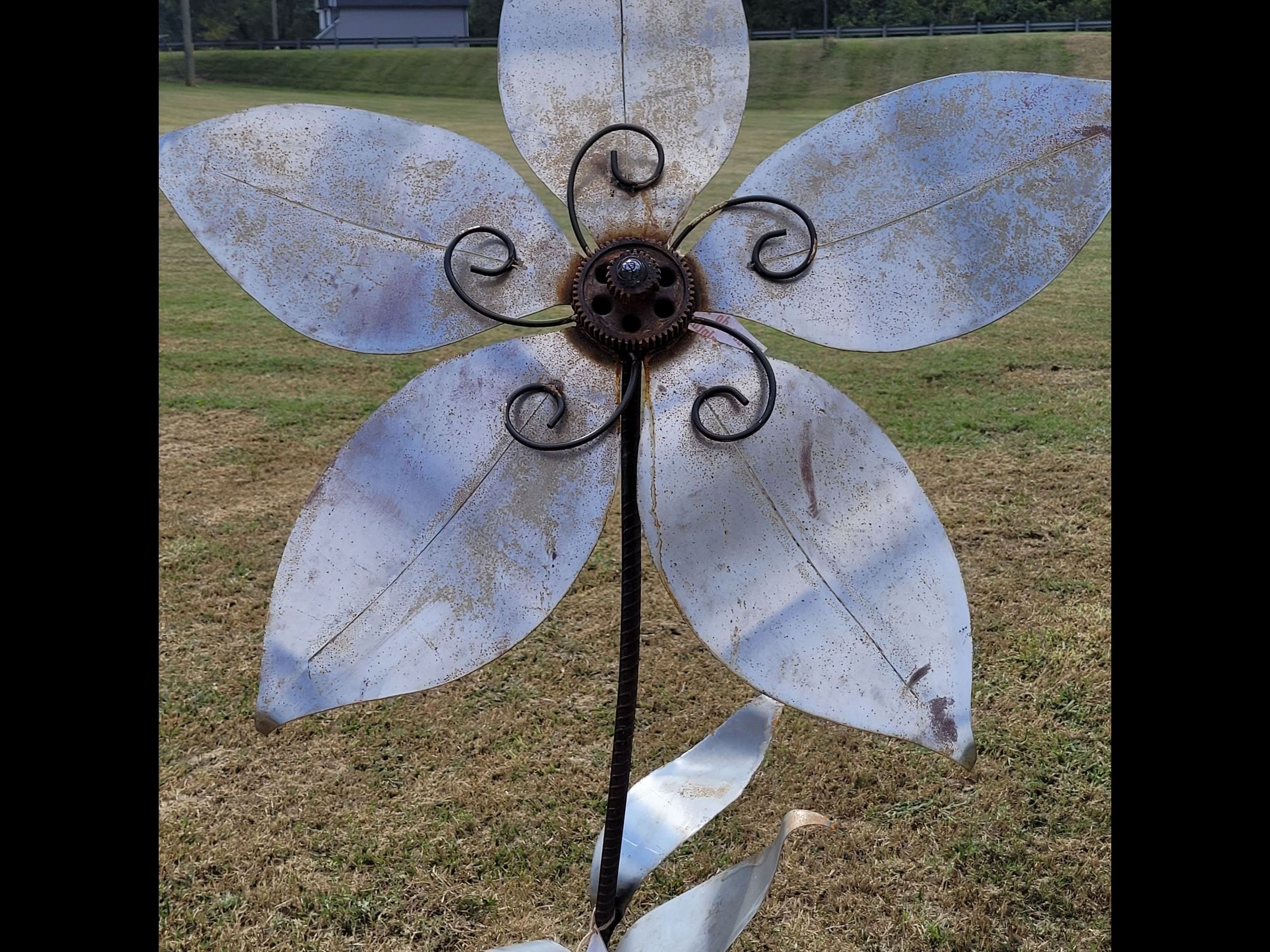 Large silver flower sculpture